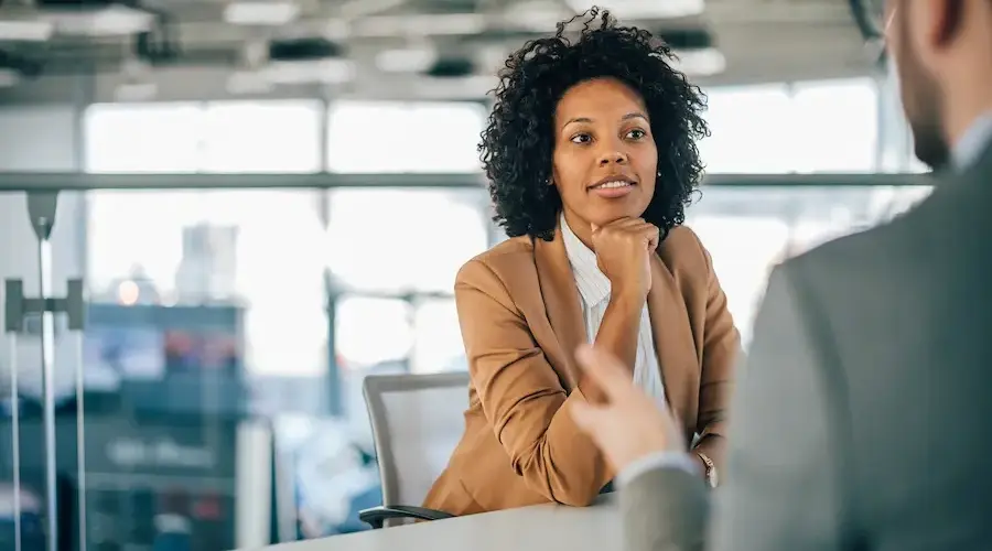 Stock photo of a black professional woman in an office.