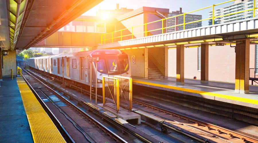 Stock image of a subway car in a station.
